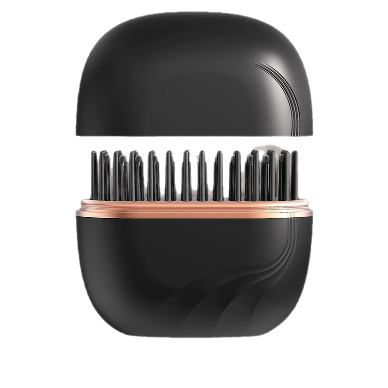 AllClear Glide in black, lid off, showing the heated comb teeth