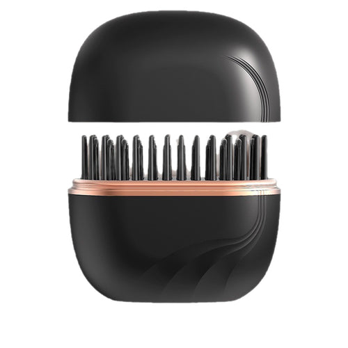AllClear Glide in black, lid off, showing the heated comb teeth